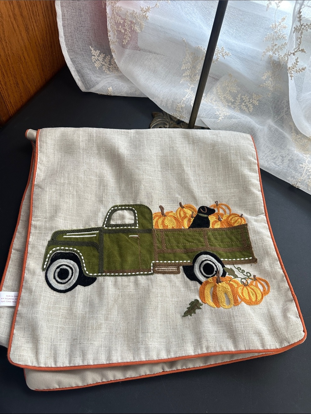 Gilded maple fall table runner with truck and dog pumpkin decor
